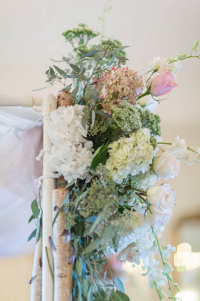 STUNNING floral arch decor in this Peach and Blush Autumn Wedding at the Tupper Manor by Kristen Jane Photography | Seen first on ConfettiDaydreams.com