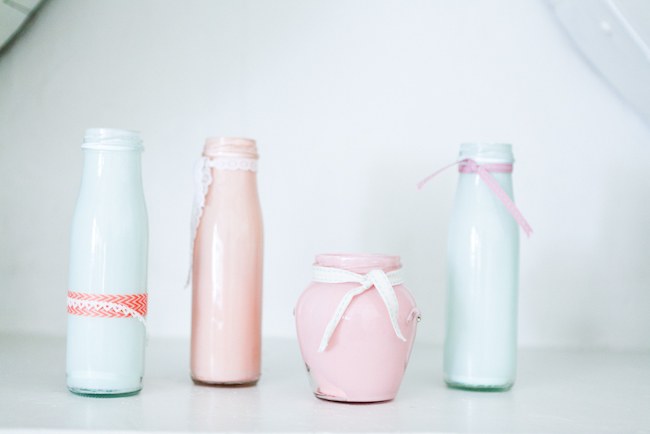 Pink, peach and powder blue DIY painted milk bottles - wedding decor  :: Pretty Pastel and Powder Blue DIY South African Wedding captured by Nadine Aucamp Photography :: Published on Confetti Daydreams Wedding Blog  