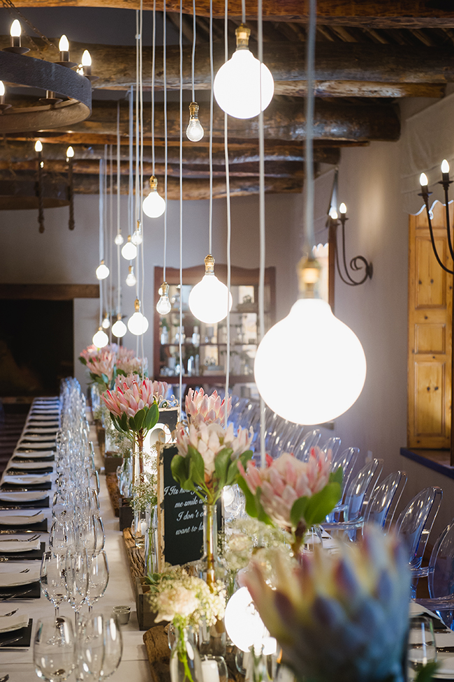 Protea Reception Table Decor // Vintage Elegance Neutral South African Wedding //Lauren Kriedemann photography // via www.ConfettiDaydreams.com // 