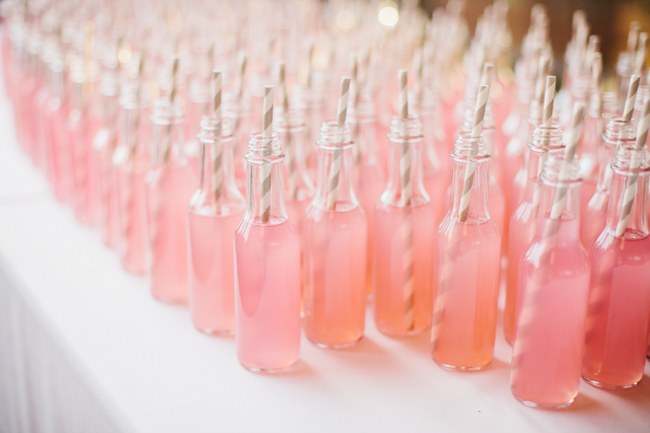 Vintage Bottles and paper Straws  - Wedding Reception Decor| Dreamy Blush Pink Grey California Wedding | Marianne Wilson Photography via ConfettiDaydreams.com