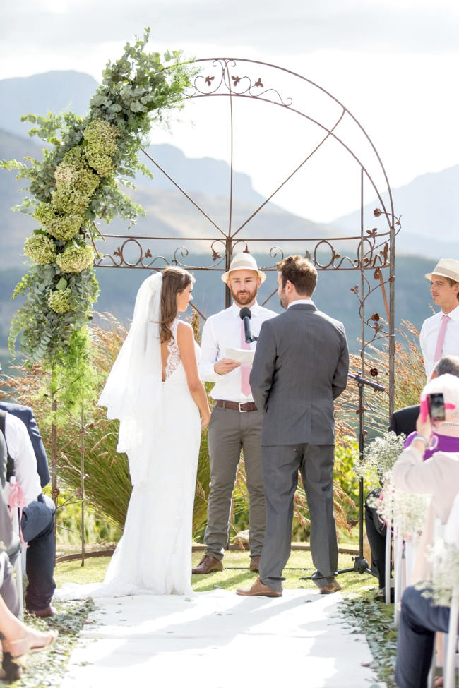 Floral Wedding arch // Franschhoek Wedding // Photography by Claire Nicola