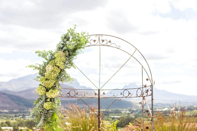 Green Organic Floral Wedding arch // Franschhoek Wedding // Photography by Claire Nicola