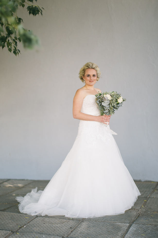 Delightful green and cream winter wedding bouquet // Beautiful Gray and Yellow Winter Wedding / Jenni Elizabeth Photography