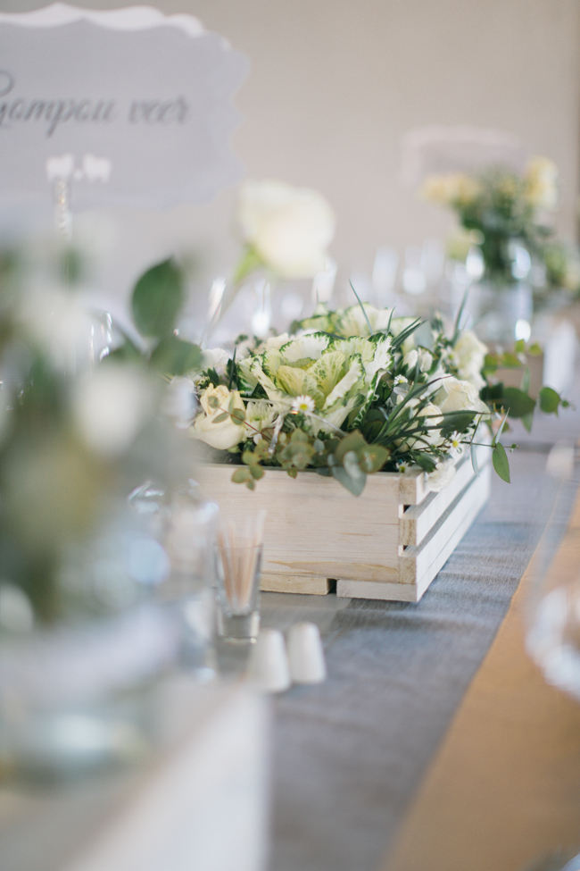 wooden crate with kale centerpiece //  Beautiful Gray and Yellow Rustic Winter Wedding Reception Decor / Jenni Elizabeth Photography