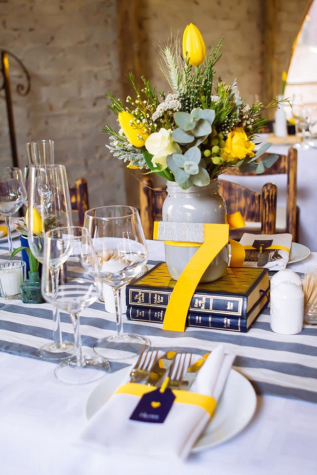 Vintage books and painted jars reception decor // Yellow and Grey DIY Vintage Wedding // Miracles Photo