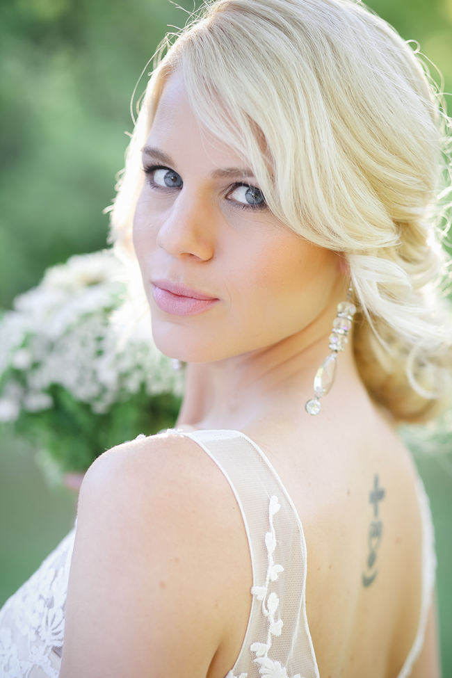  A deep V style Lace back wedding dress shows off tattoo. Lovely Rustic Garden Picnic Wedding // Nikki Meyer Photography