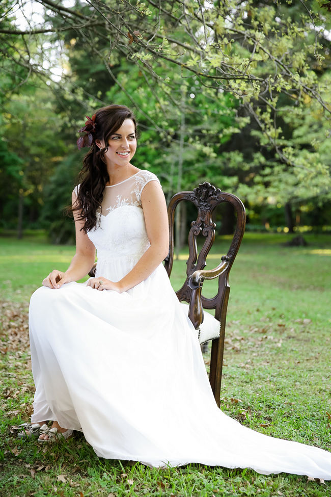 Loose, long waves and a Robyn Roberts wedding dress with sheer, illusion neckline perfect for a Rustic Garden Picnic Wedding // Nikki Meyer Photography