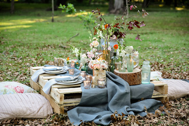  A pretty pallet picnic table using grey hessian burlap runner, filled with rustic decor elements, mercury votives, wood slabs and peach blooms in mix and match vases. Rustic Garden Picnic Wedding // Nikki Meyer Photography