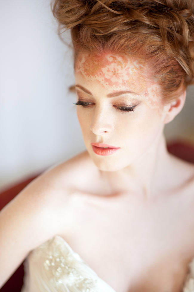 Delicately airbrushed lace tattoo blends perfectly with her strawberry blonde locks! See more Blush Gold Whimsical Wedding Ideas by St Photography by clicking.