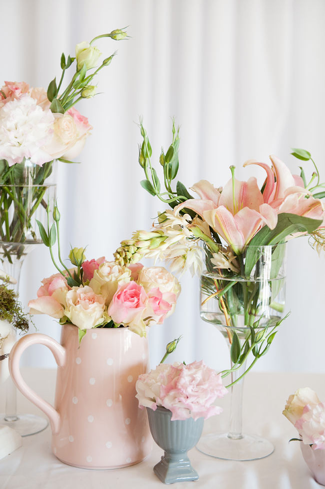 Pretty blush, Cream and Gold wedding flowers: Roses, blusing brides, carnations and lilies. Pics by St Photography