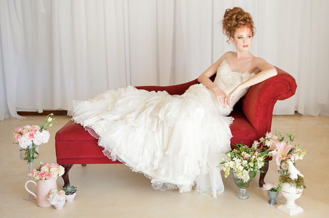 Love this delicate cream wedding dress with ruffles.