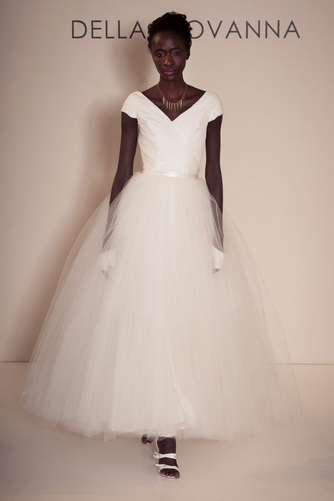 Cap sleeved V-Neck bodice with princess style tulle skirt from Della Giovanna Wedding Dresses