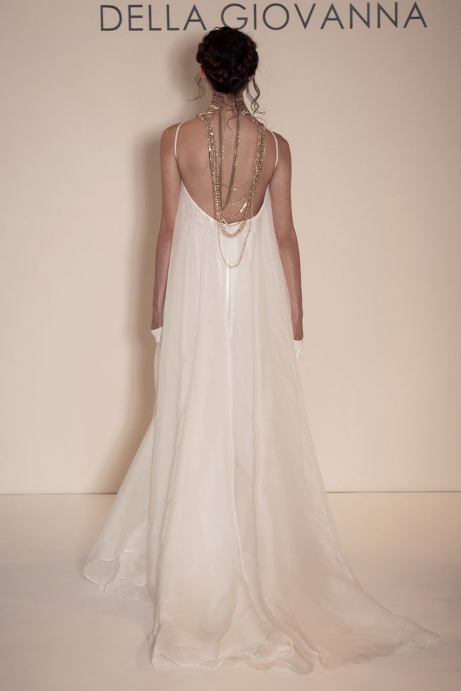 Relaxed, loose fitting wedding dress with gold necklace, chain style detail. Della Giovanna Wedding Dresses