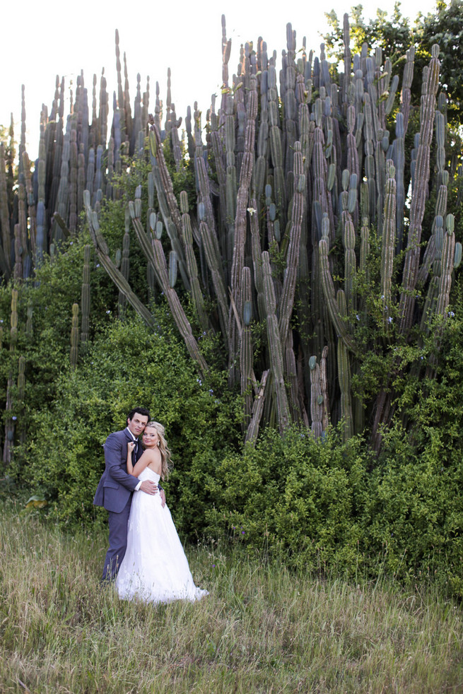 Groom in grey suit with grey tie. Green White Rustic South African Wedding // Justin Davis Photography