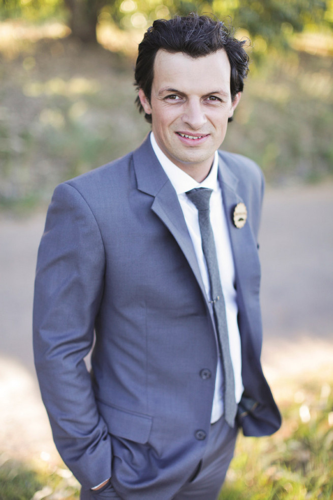 Groom in grey suit with grey tie. Green White Rustic South African Wedding // Justin Davis Photography