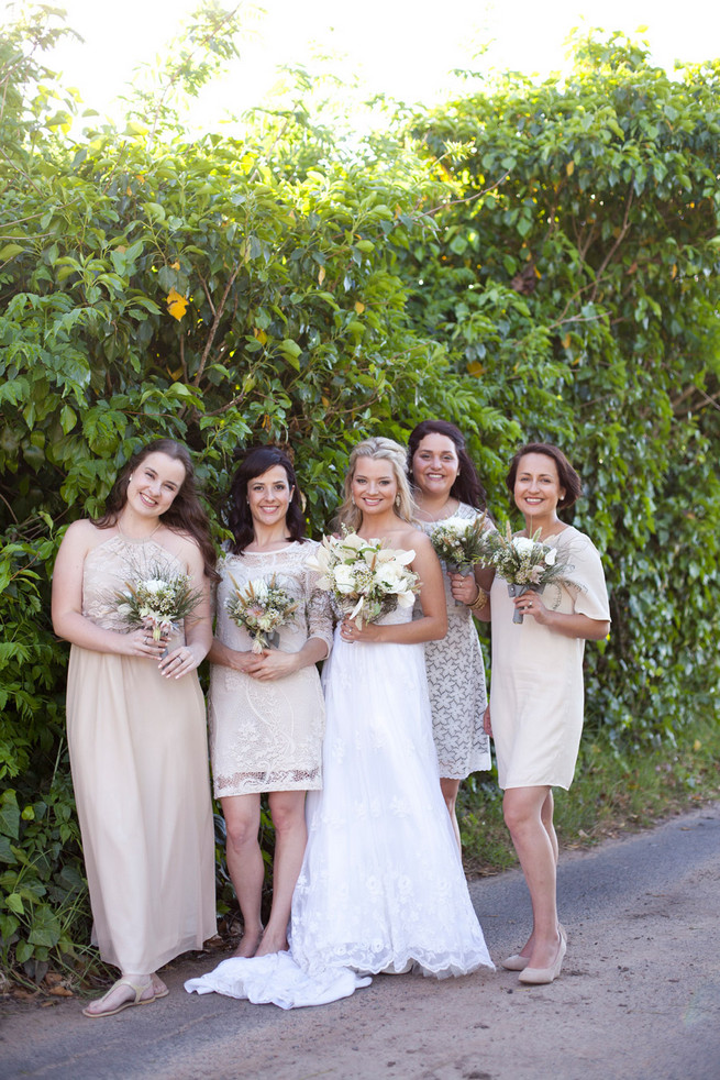 Taupe mix and match bridesmaids with green, white brown bouquets.  Green White Rustic South African Wedding // Justin Davis Photography
