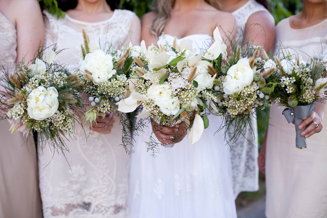 Taupe mix and match bridesmaids with green, white brown bouquets.  Green White Rustic South African Wedding // Justin Davis Photography