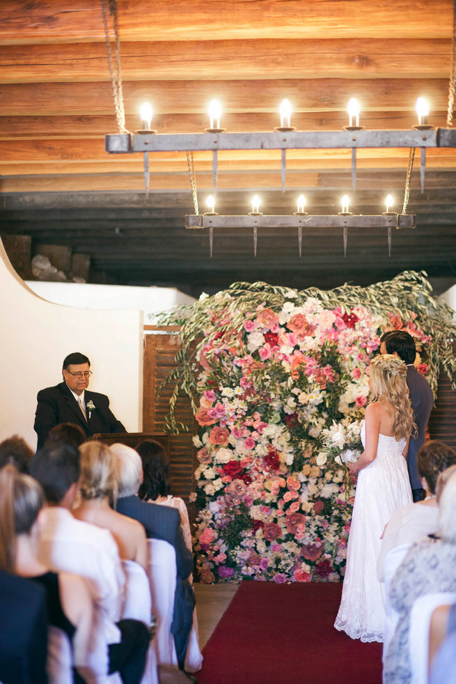 Love this backdrop! Groom in grey suit with grey tie. Green White Rustic South African Wedding // Justin Davis Photography