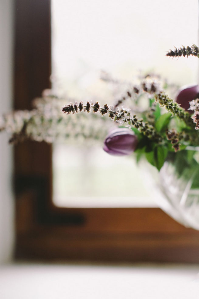 Single stem lavender and purple tulips in glass vases. Simple and effective. Gorgeous Navy Gold Wedding at Babylonstoren / Charlene Schreuder Photography 