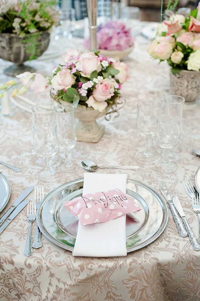 Blush and pink wedding flowers in silver urns and vases on wedding reception tables: hydrangea, pink and cream roses, lisanthius and leatherleaf ferns . So pretty for a spring wedding // D’amor Photography