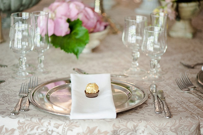 Blush and pink wedding flowers in silver urns and vases on wedding reception tables: hydrangea, pink and cream roses, lisanthius and leatherleaf ferns . So pretty for a spring wedding // D’amor Photography