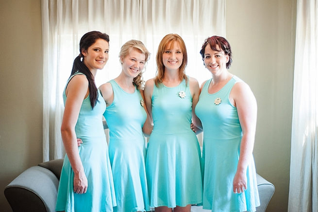 Getting ready: bridesmaids wore matching baby blue dresses the morning before the wedding ceremony // D’amor Photography