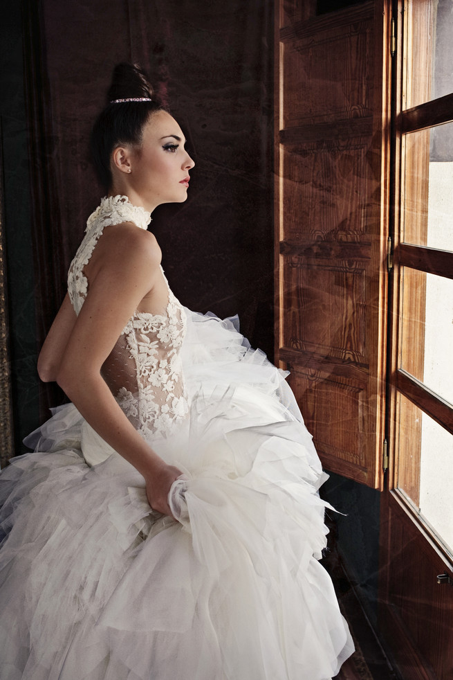 Dreamy wedding dress with layered tulle, lace front and open back. Ramon Herrerías Wedding Dresses 