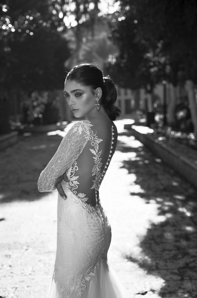 Long, lace sleeved Riki Dalal 2015 Wedding Dress with deep V plunging neckline and illusion back with lace tattoo