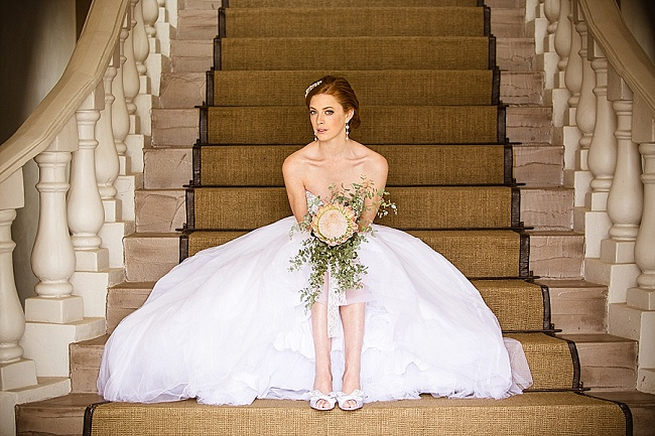 Beaded bodice and tulle skirt with King Protea wedding bouquet. Soft Pink and Gold Wedding by Samanatha Jackson Photo