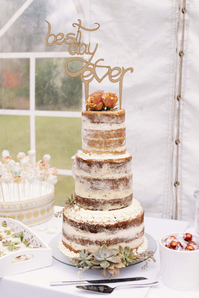 Stunning naked wedding cake decorated with succulents and laser cut wooden cake topper: Best Day Ever