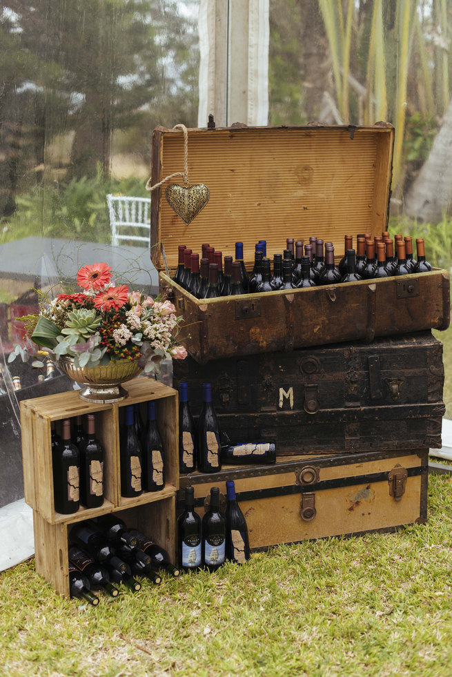 Rustic vintage suitcases and crates with drinks // Succulent Garden Wedding // Claire Thomson Photography