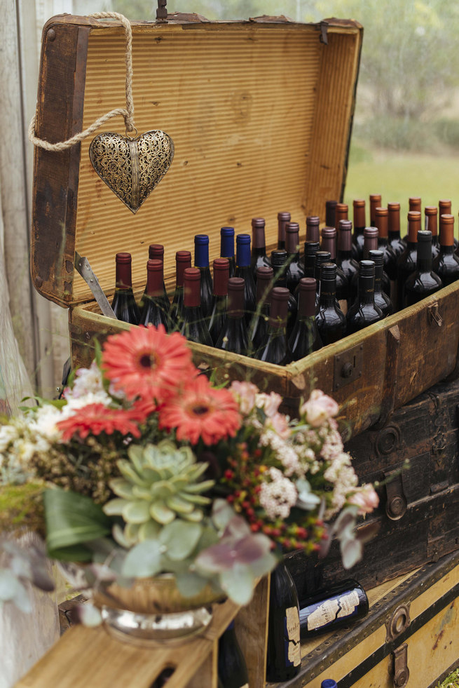 Rustic vintage suitcases and crates with drinks // Succulent Garden Wedding // Claire Thomson Photography