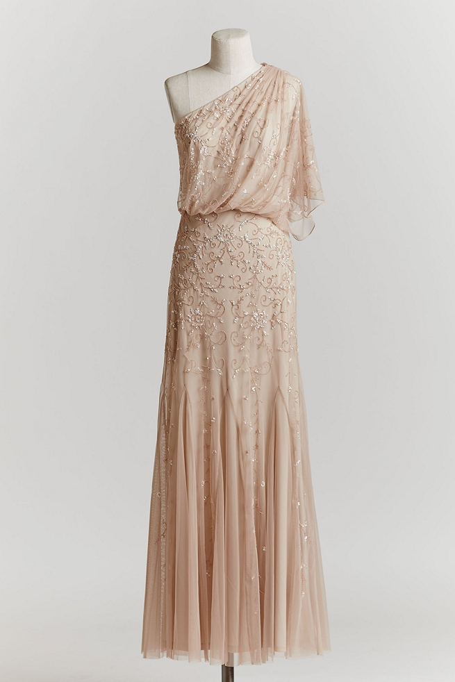 Vintage Wedding Dress in Blush: This soft blush gown with draped, off the shoulder sultriness is embellished with a vine-inspired pattern of sequinned and sparkle detailing. This lovely gown would also make a magnificent MOH gown, too!