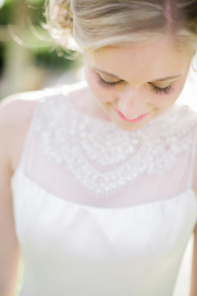 Love the statement neck on her Victor Harper gown - so perfect for a subtle but sparkly 1920s wedding soiree! Glamorous Gatsby Inspired Wedding by Elyse Hall Photography