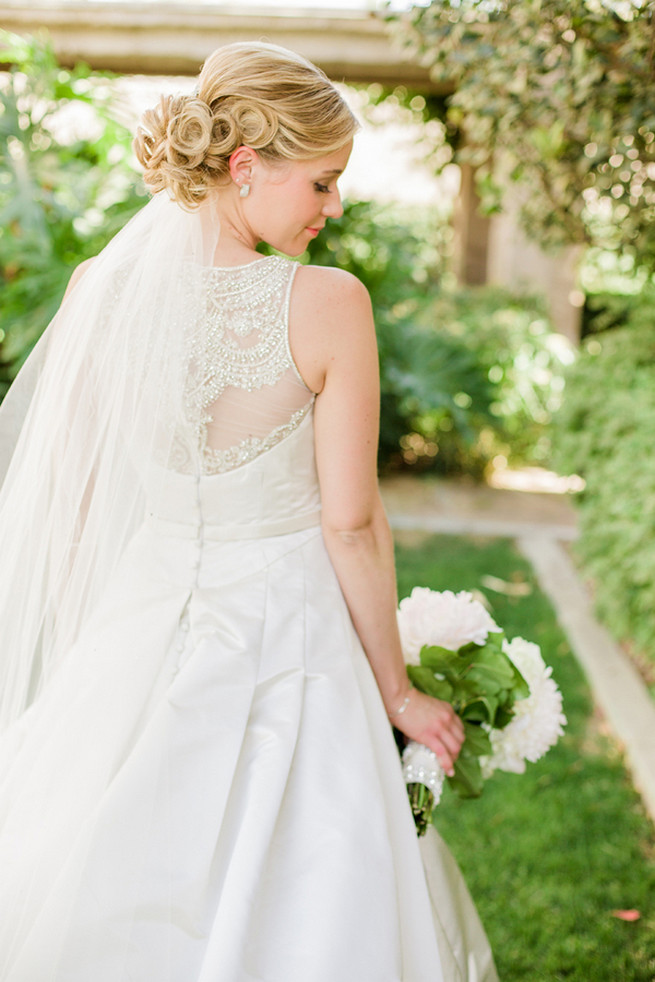 Love the statement back and neck on her Victor Harper gown - so perfect for a subtle but sparkly 1920s wedding soiree! Glamorous Gatsby Inspired Wedding by Elyse Hall Photography