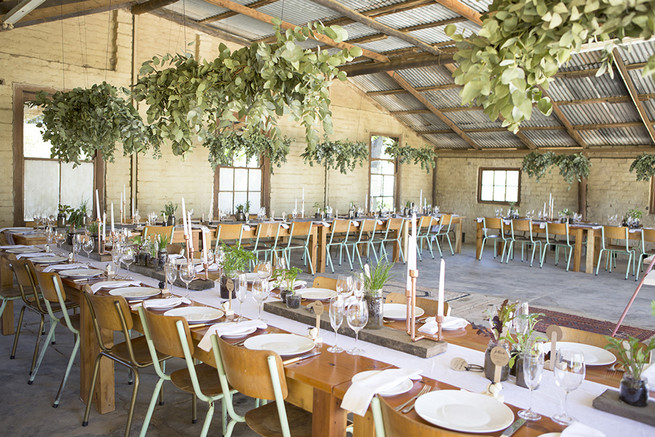 Long farmstyle tables with Gold candle holders and herb planters // // Organic Farm Style Karoo Wedding // christine Le Roux Photography