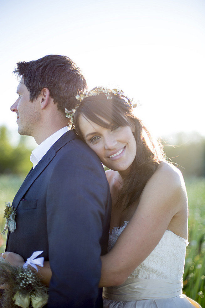  Couple wedding photographs in a field of onion flowers // Organic Farm Style Karoo Wedding // christine Le Roux Photography