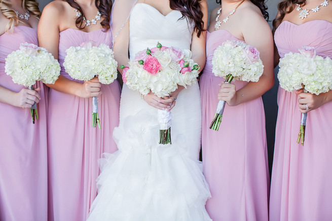 White bouquets and Bridesmaids wearing long blush strapless gowns // Modern Romance: Pink and Silver Wedding // Jessica Q Photography