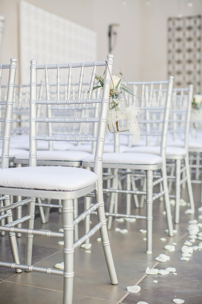 Silver wedding chairs with cream roses // Modern Romance: Pink and Silver Wedding // Jessica Q Photography