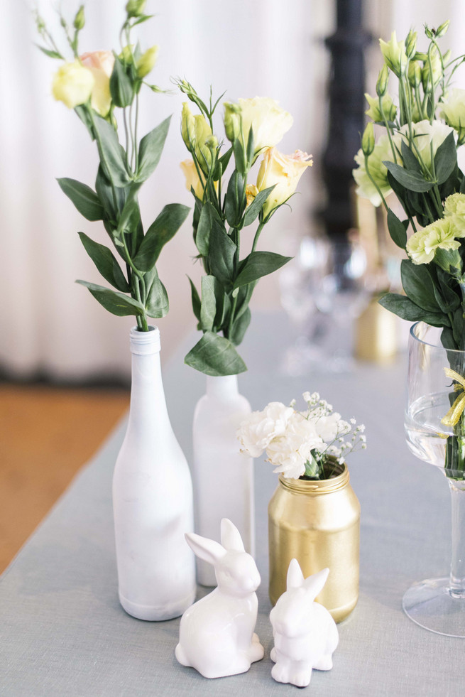 DIY painted bottles and jars in white and gold. White and Gold DIY Chevron Wedding, South Africa, by Claire Thomson Photography