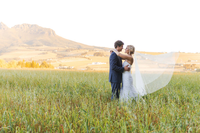 Fields of love. Couple photos in front of a vintage volkswagen van. ite and Gold DIY Chevron Wedding, South Africa, by Claire Thomson Photography