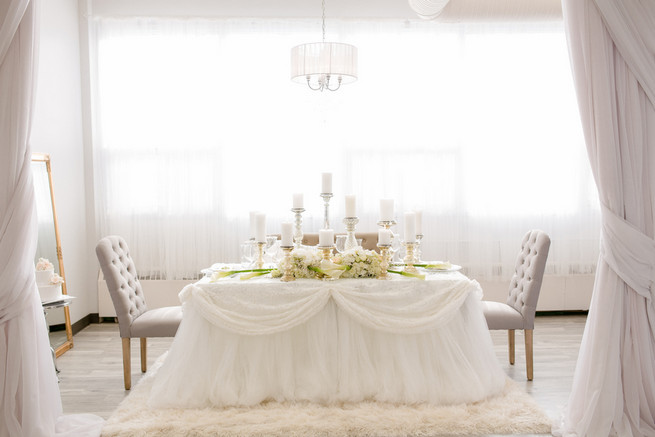 Super chic sweetheart table! White on White Glamorous Wedding Ideas by ENV Photography. Styled by Elegant Touches and Atmosphere Weddings