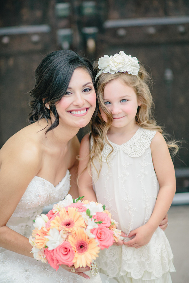 Peach Gerbera, Pink roses, White Hydrangea and white chrysanthemum bouquets. Cute Coral Gray wedding at Briscoe Manor, Houston, by Luke and Cat Photography