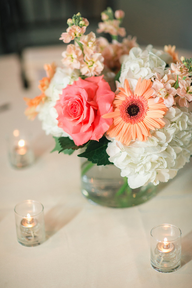 Simple but elegant. White hydrangea, coral roses and peach gerbera. Cute Coral Gray wedding at Briscoe Manor, Houston, by Luke and Cat Photography
