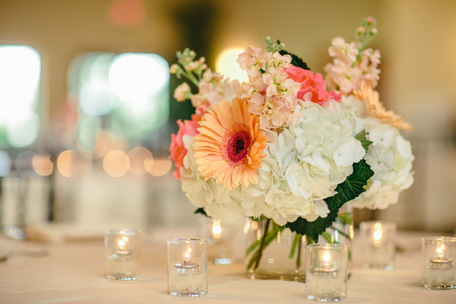 Simple but elegant. White hydrangea, coral roses and peach gerbera. Cute Coral Gray wedding at Briscoe Manor, Houston, by Luke and Cat Photography