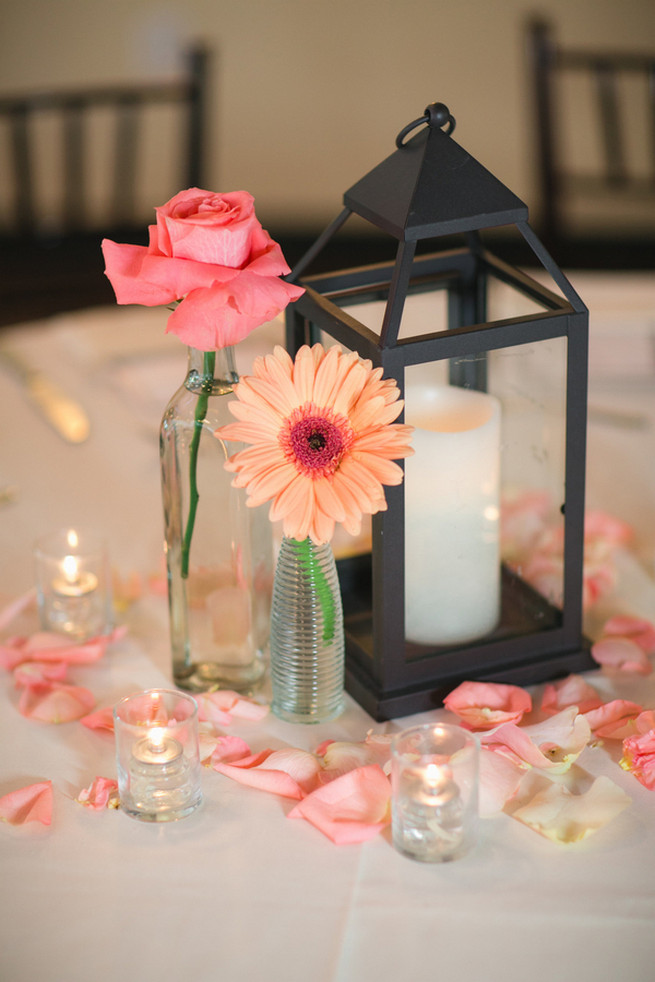Single stem gerbera and rustic lantern. Cute Coral Gray wedding at Briscoe Manor, Houston, by Luke and Cat Photography