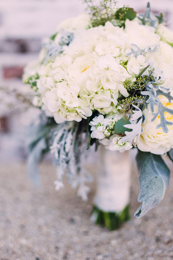 Romantic wedding bouquet of white hydrangea, white garden roeses, peony, dusty miller and lambs ear with white bouquet wrap. / Alyssa Kristin's elegant Milwaukee Wedding Valo Photography