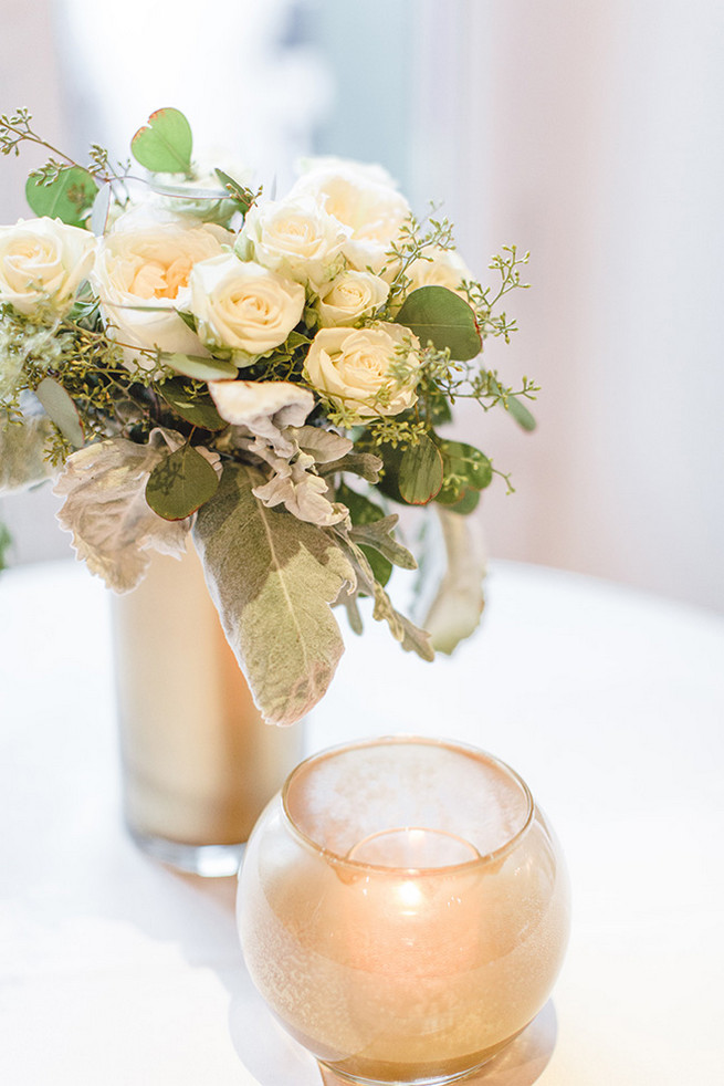 DIY painted gold vases with re-purposed bridesmaids bouquets of cream roses and dusty miller. / Alyssa Kristin's Elegant Milwaukee Wedding Valo Photography