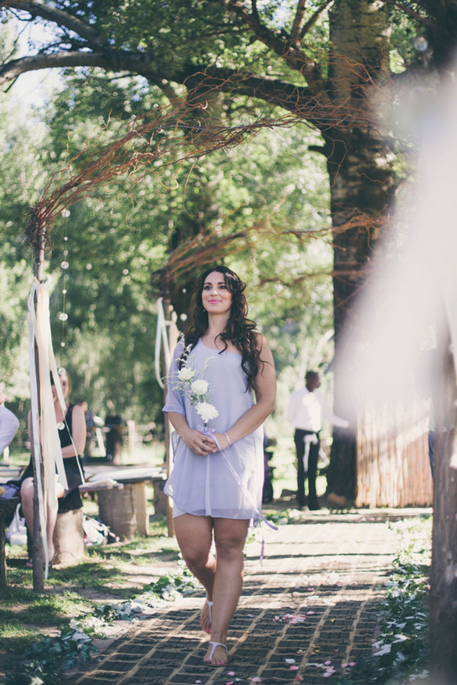 Bridesmaid in grey off the short short dress and three white flowers. Grey White Farm Wedding, South Africa // Maryke Albertyn