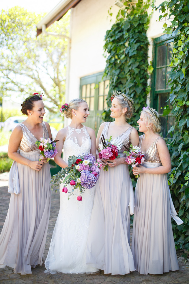 Purple hydrangea, pink, red and white tulips, pink roses and eucalyptus bridal bouquet. Pink, purple and green Natte Valleij Stellenbosch Wedding by Adene Photography